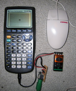 Photo of calculator and mouse.