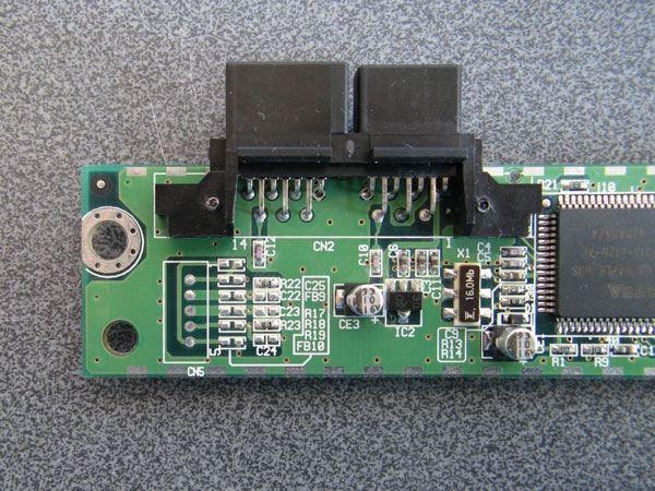 Photo of unpopulated region of the Dreamcast Race Controller PCB