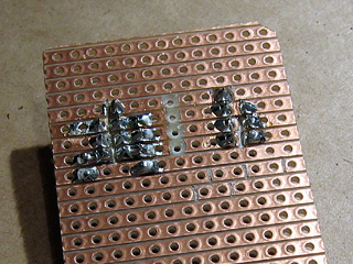 Stripboard with cuts between holes