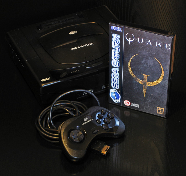 Sega Saturn console, controller and copy of the game 'Quake'