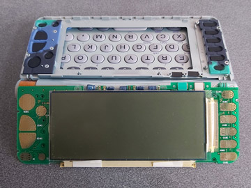 Photo of the LCD glass mounted to the PCB inside the OZ-770 screen
