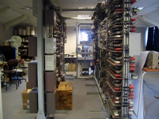 A view between the front and back of the Colossus, showing some more of the valves (the front of the machine is to the right of this picture).
Replacement valves are apparently sourced from ones left over after telephone exchange upgrades.