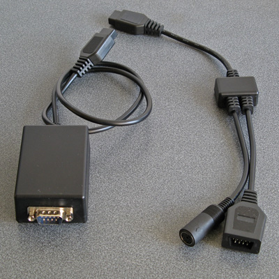An RS-232 serial adaptor and PS/2 keyboard adaptor for the Master System.