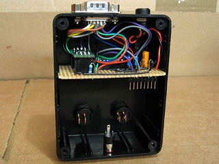 Video amplifier circuit board hooked up and installed in the case